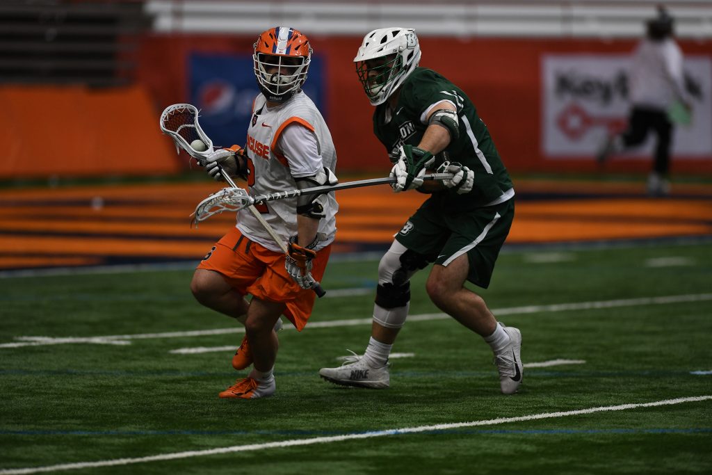 Griffin Cook takes the ball while Binghamton’s Tom Galgano defends. Cook had 3 goals in the game.