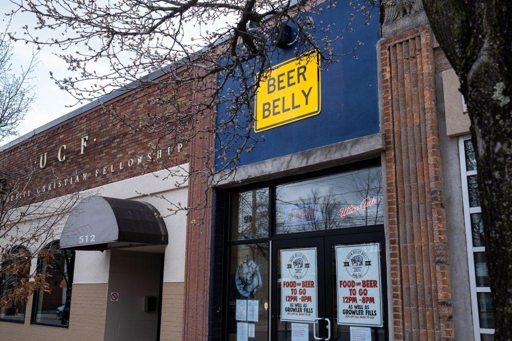 Beer Belly Deli on Westcott street remains open to serve takeout and delivery. This is a favorite of many Syracuse University students. Westcott street is also very empty.
