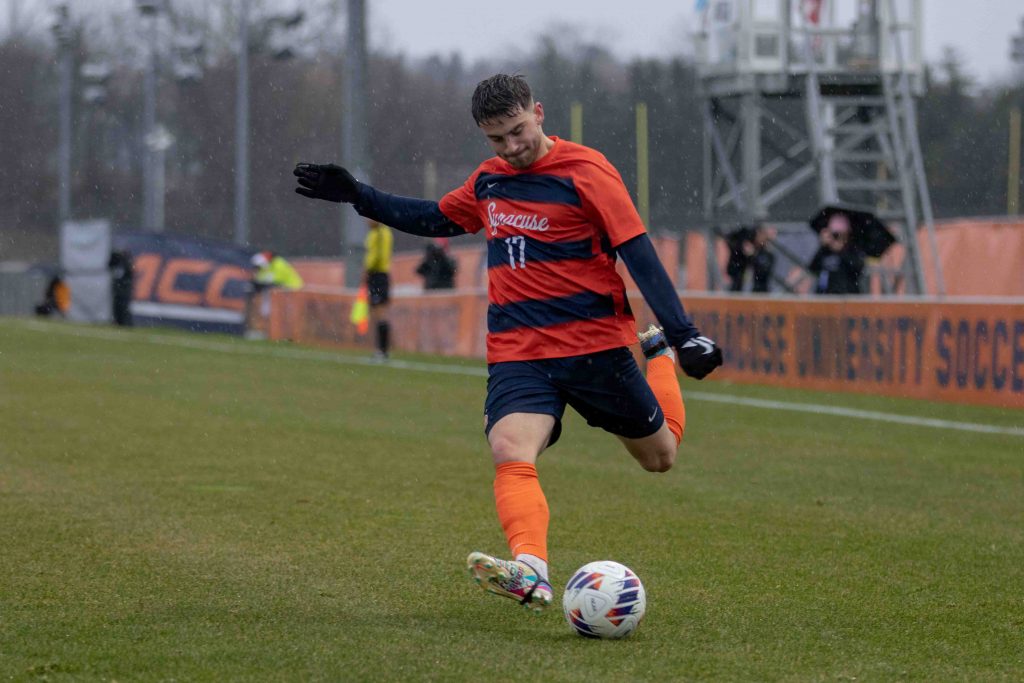 Syracuse Giona Leibold (17) shoots the ball in an attempt to score against Cornell men's soccer on Sunday.
