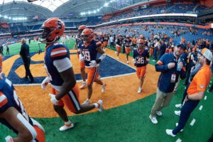 Lucas Vermuelen trots out onto the field at the JMA Wireless Dome.