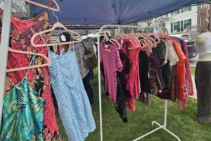 Homemade hats and headwear on a table at the Campus Farmers Market in Syracuse, N.Y., on April 12, 2026.
