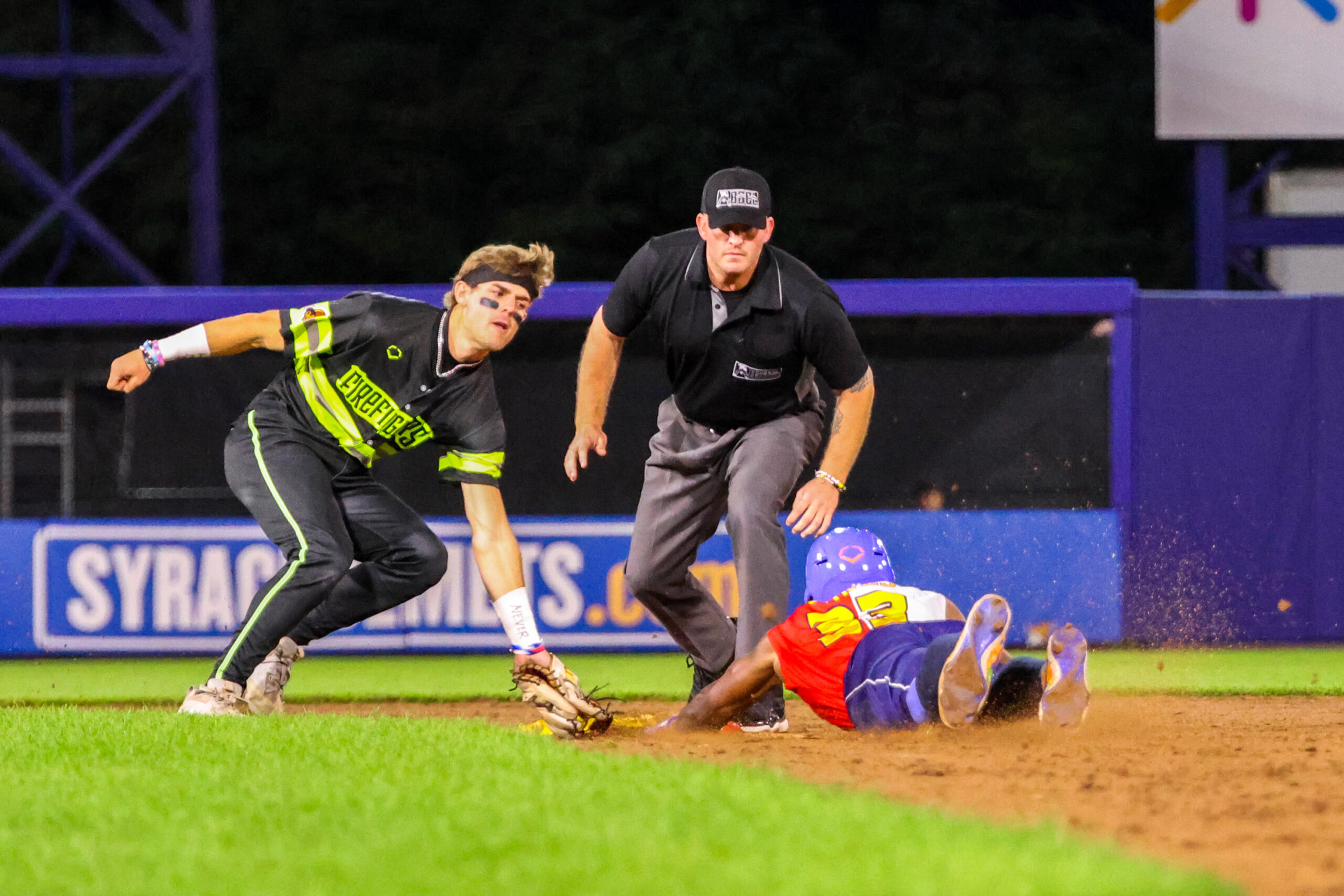 Texas Tailgaters outfielder Tre Jones (33) slides safely into second base during Banana Ball game against the Texas Tailgaters on Friday, September 11th, 2026 at NBT Bank Stadium.