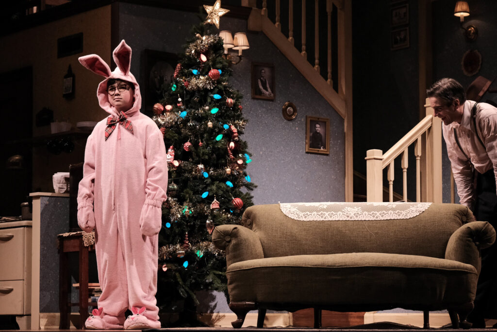 kid on stage in pink bunny costume