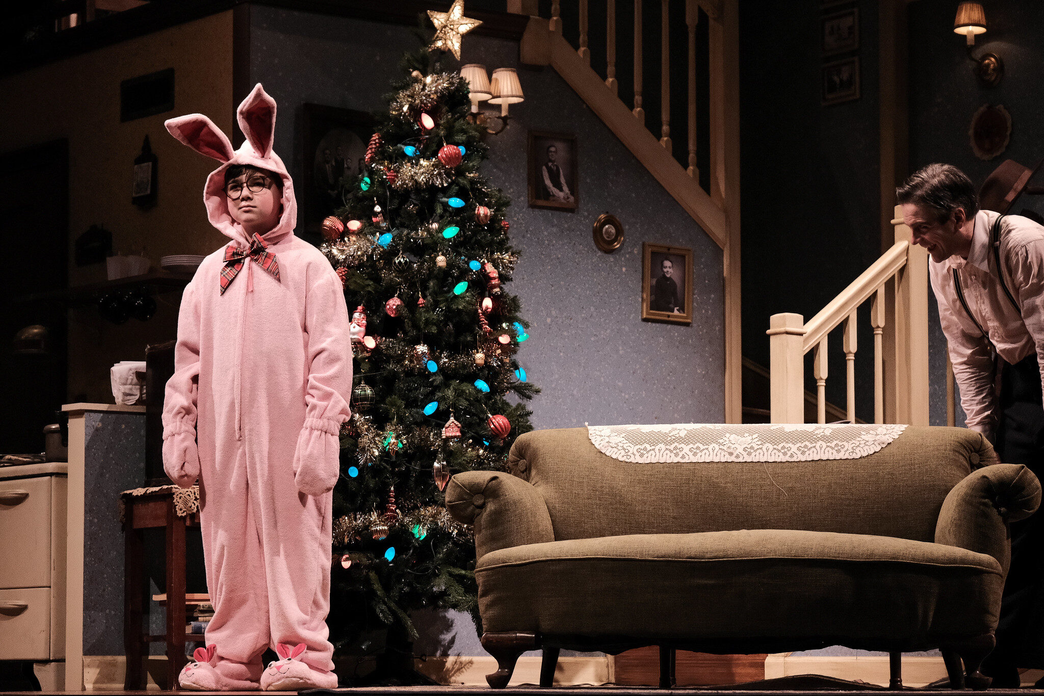 kid on stage in pink bunny costume