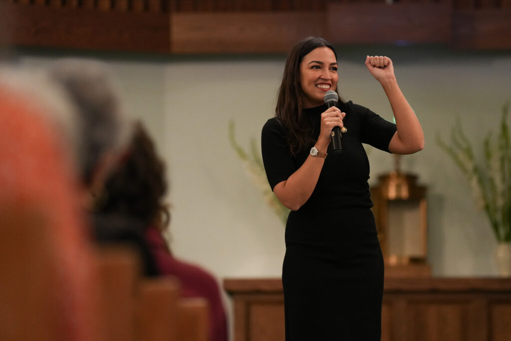 U.S. Rep. Alexandria Ocasio-Cortez speaks ahead of the 2026 midterm elections at All Saints Church on the east side of Syracuse, N.Y. Monday, Sept. 28, 2026.