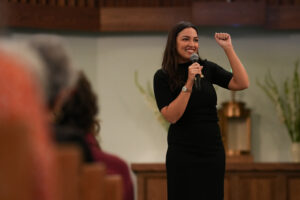 U.S. Rep. Alexandria Ocasio-Cortez speaks ahead of the 2026 midterm elections at All Saints Church on the east side of Syracuse, N.Y. Monday, Sept. 28, 2026.