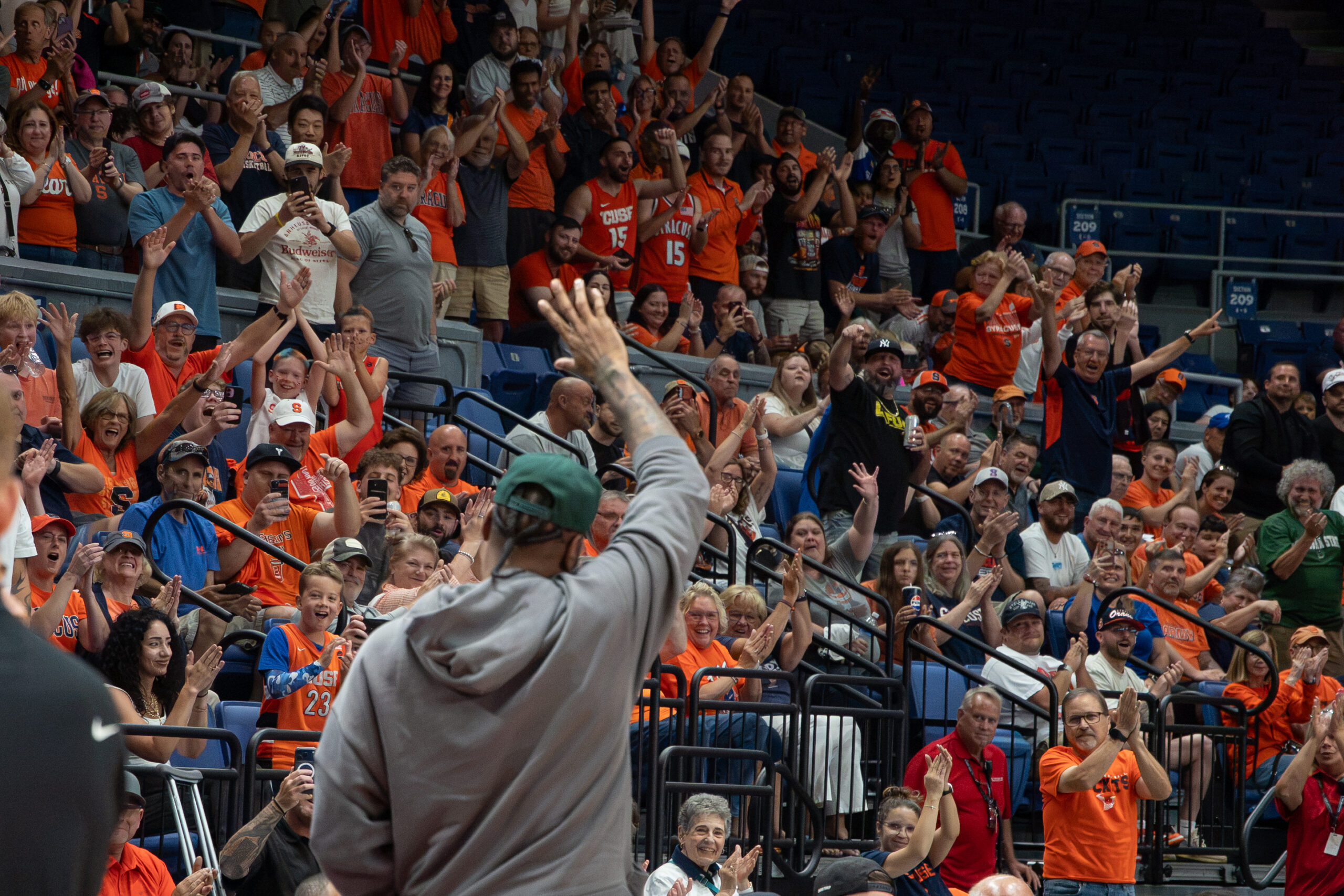 SU alum Carmelo Anthony waves to Boeheim's Army fans during Thursday's first round game of The Basketball Tournament at the Upstate Medical Arena at War Memorial.
