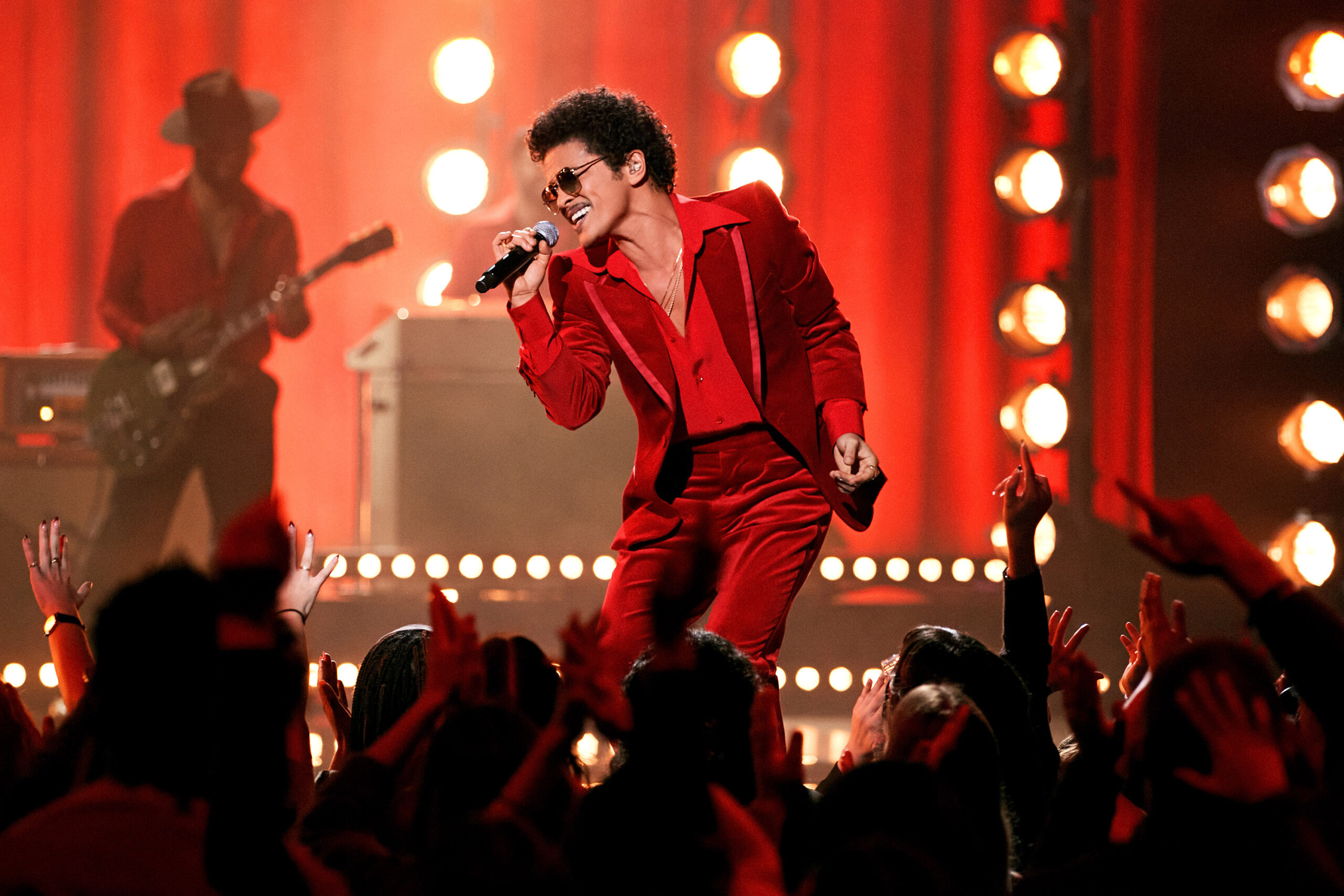 In this image released on November 21, Bruno Mars of Silk Sonic perform onstage for the 2021 American Music Awards at Microsoft Theater broadcast on November 21, 2021 in Los Angeles, California.