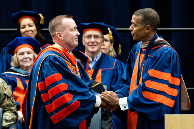 Syracuse University’s 13th Chancellor Michael Haynie is bestowed the official chancellor’s medallion during his inauguration on Friday, Sept. 18, 2026, at the JMA Wireless Dome.