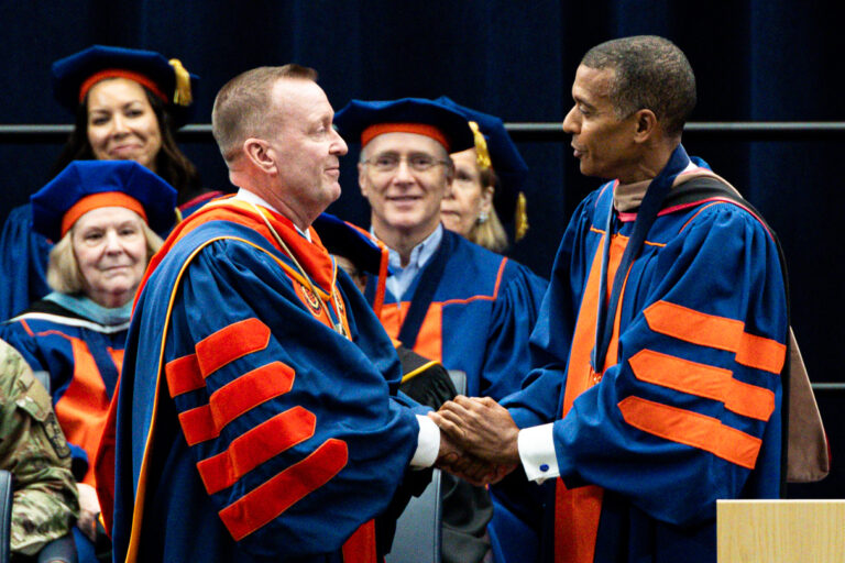 Syracuse University’s 13th Chancellor Michael Haynie is bestowed the official chancellor’s medallion during his inauguration on Friday, Sept. 18, 2026, at the JMA Wireless Dome.
