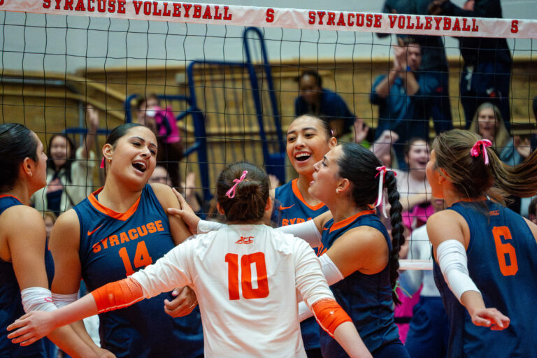 Syracuse setter Tehya Maeva fires up the rest of the Syracuse starters as she notches her season high in kills, Friday against California at the Women's Building.