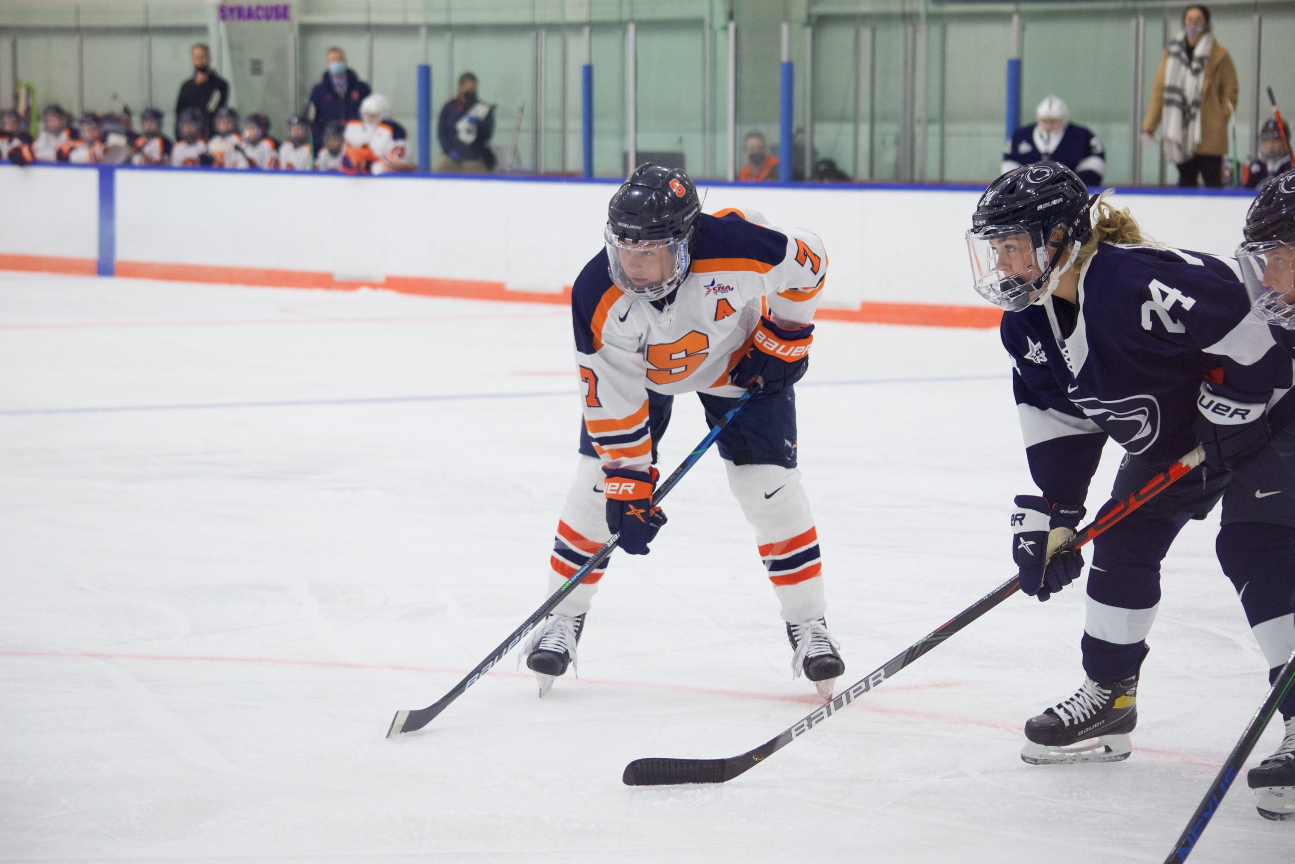 Syracuse senior assistant captain Emma Polaski lines up for an offensive zone face off during the Orange's game against Penn State on Dec. 12, 2020.