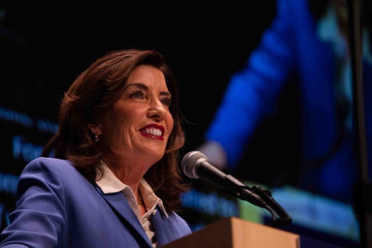New York state Governor Kathy Hochul speaks on stage at the Carrier Theater during the Democratic Convention.
