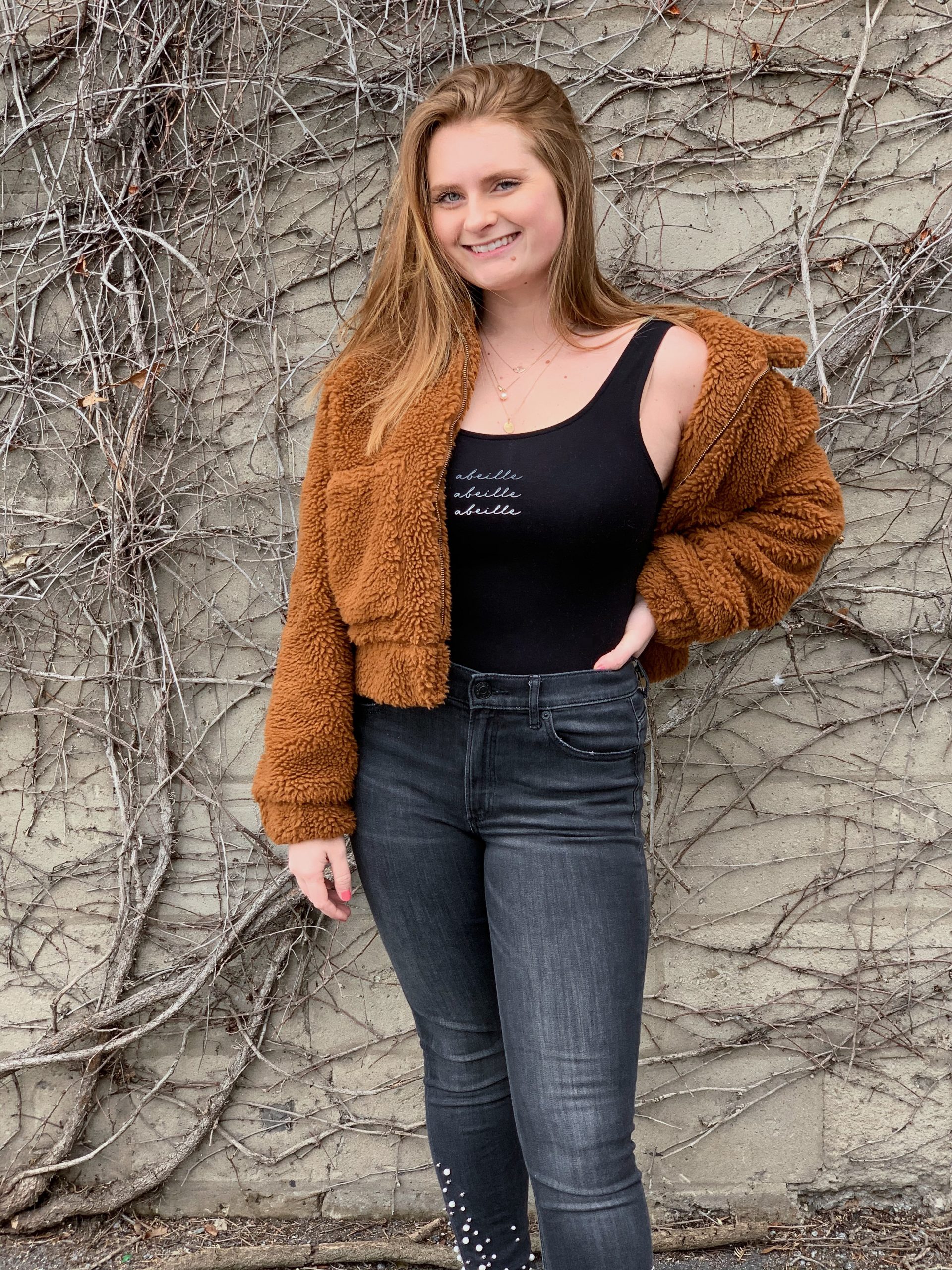 Abbey Thurston wearing an Abeille bodysuit