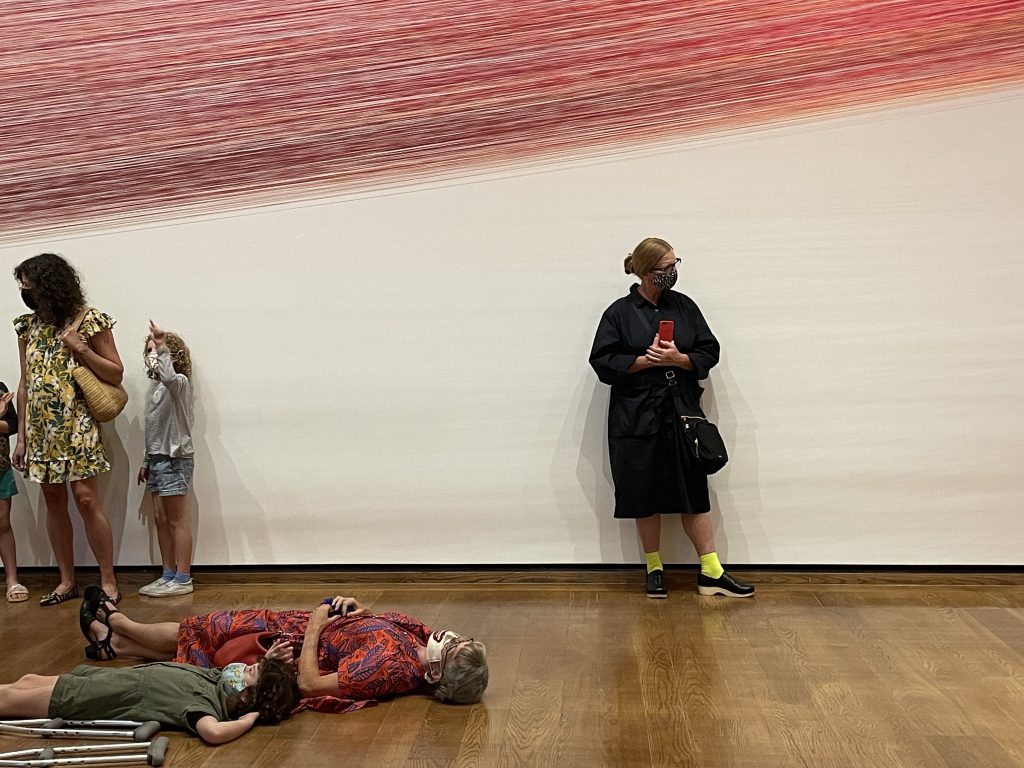 Anne Lindberg stands under