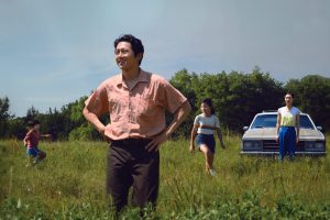 Alan S. Kim, Steven Yeun, Noel Cho, Yeri Han in a field