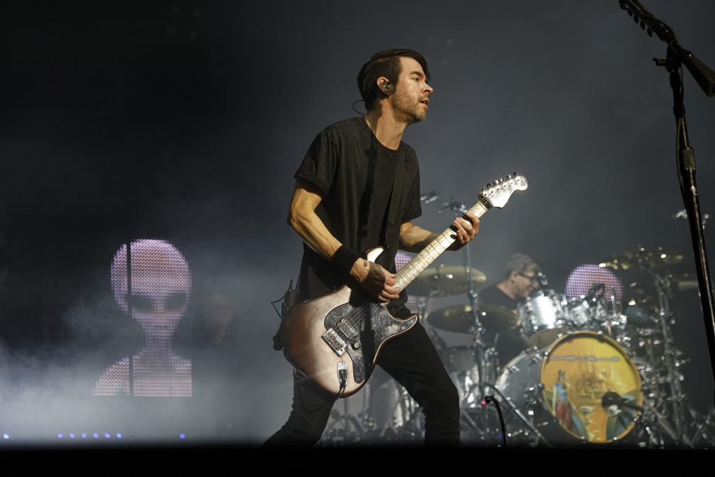 Chevelle lead singer Pete Loeffler and drummer Sam Loeffler open their performance with