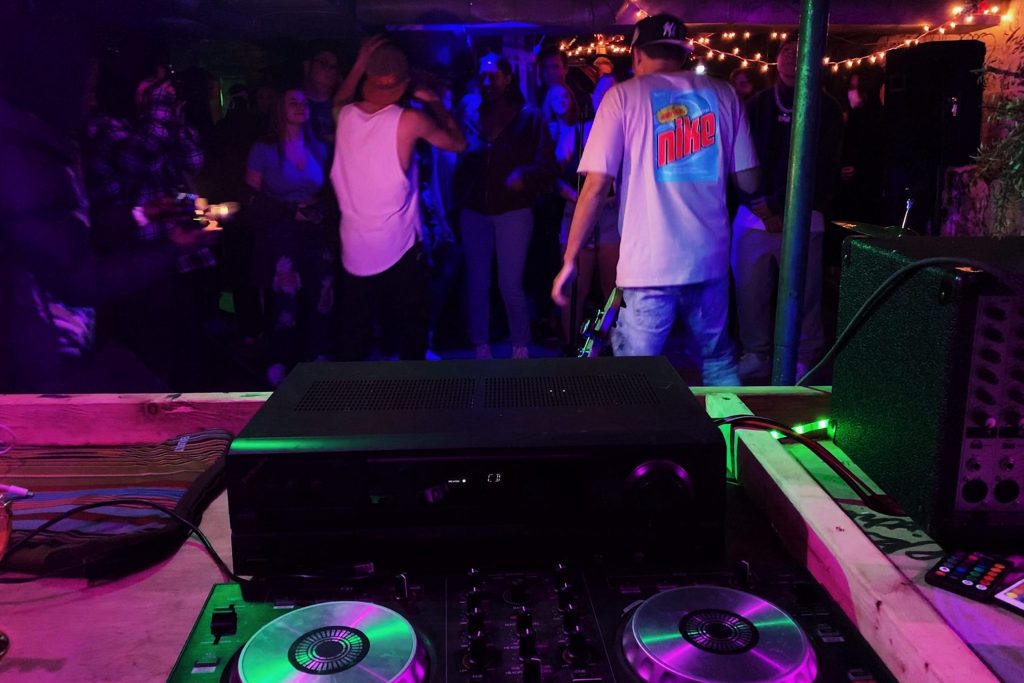 Swaggy J and BJ rap at The Harrington house show on Dec. 2.