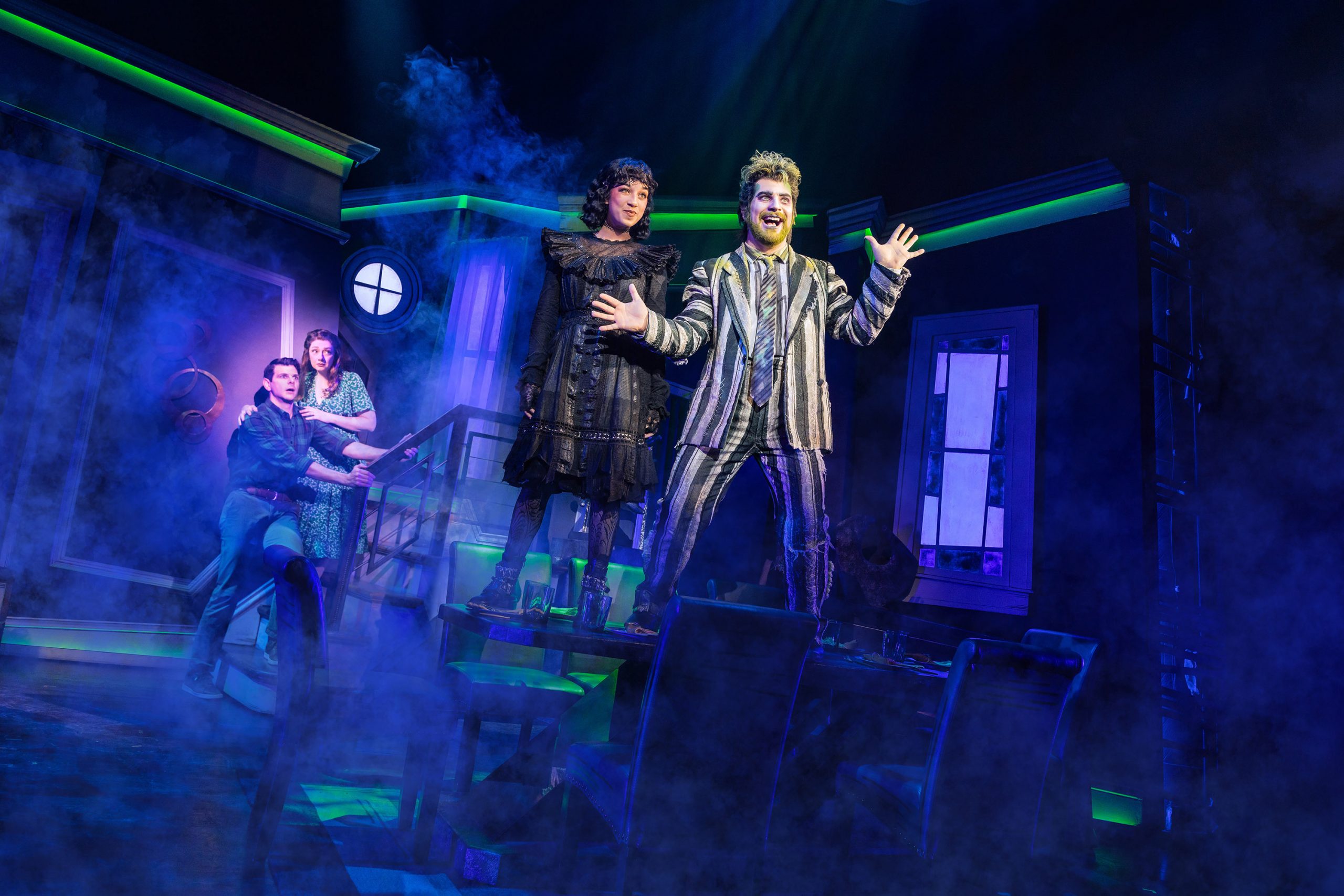 Will Burton (Adam), Megan McGinnis (Barbara) with Madison Mosley (Lydia) and Justin Collette (Beetlejuice) in the Broadway touring production of "Beetlejuice."