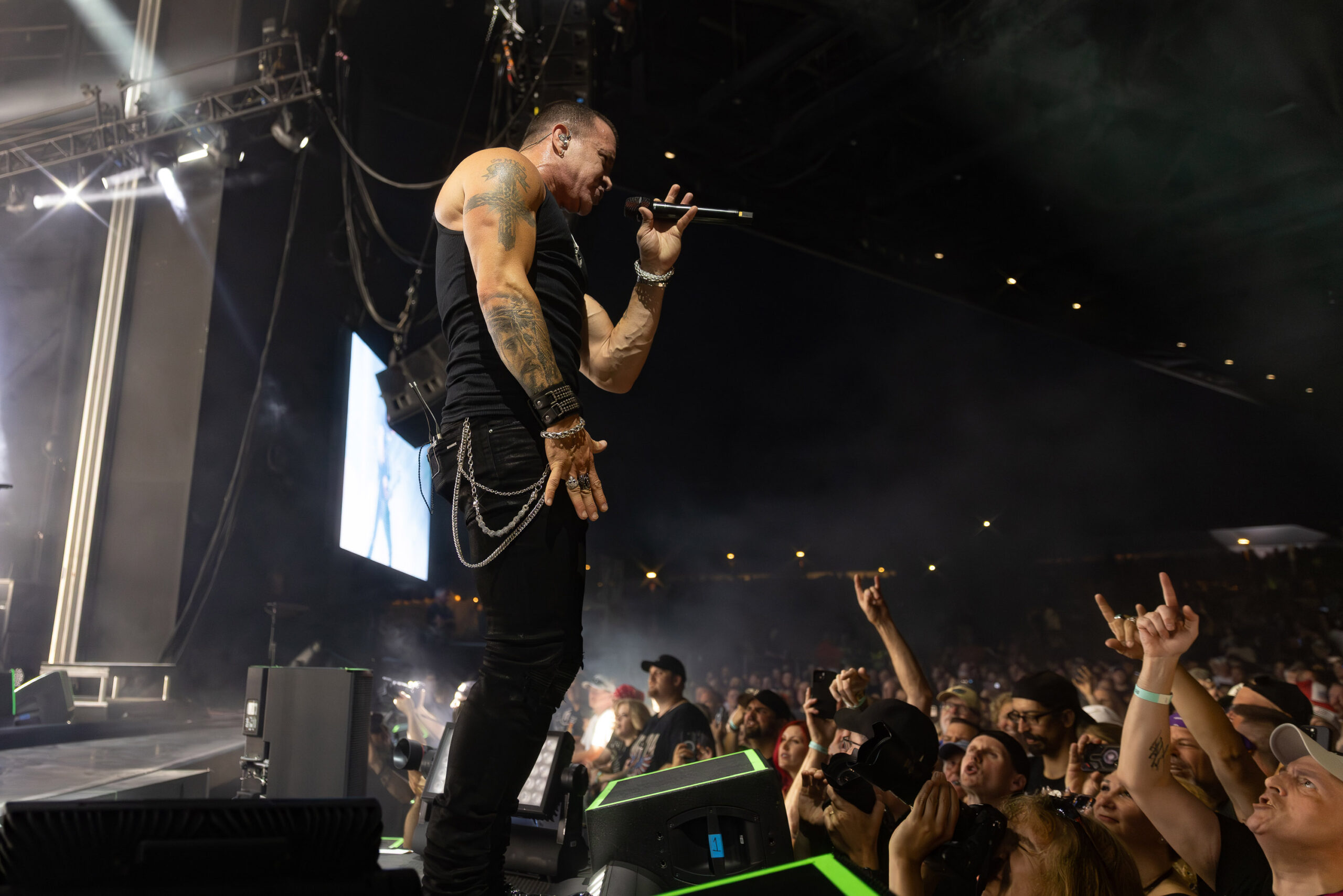 Creed's Scott Stapp sings to the crowd from the catwalk during the “Return of the Summer of '99 Tour” at the Empower FCU Amphitheater at Lakeview on Friday, July 11, 2025, in Syracuse, N.Y. Photo by Kayla Breen.