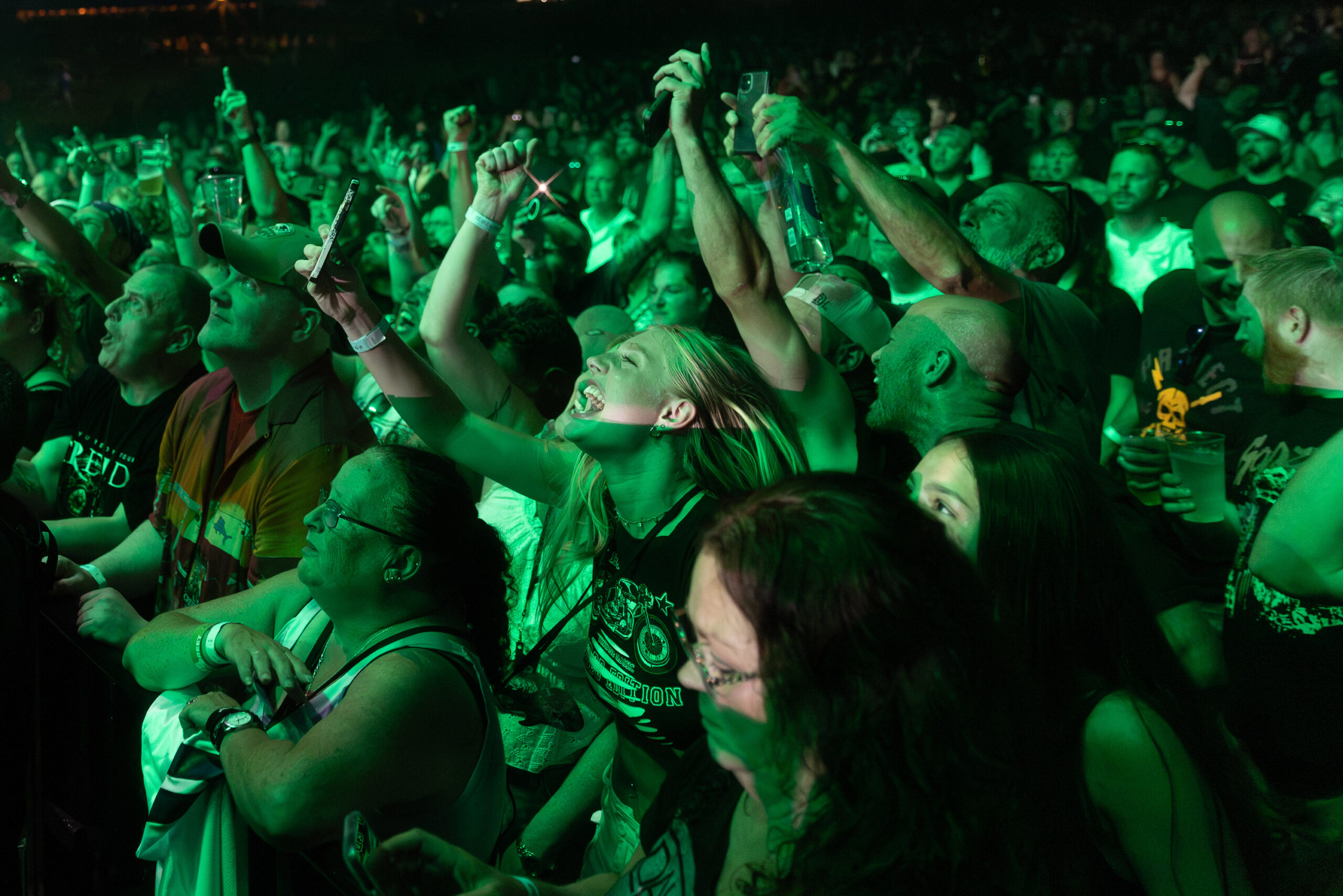 Fans scream the lyrics to