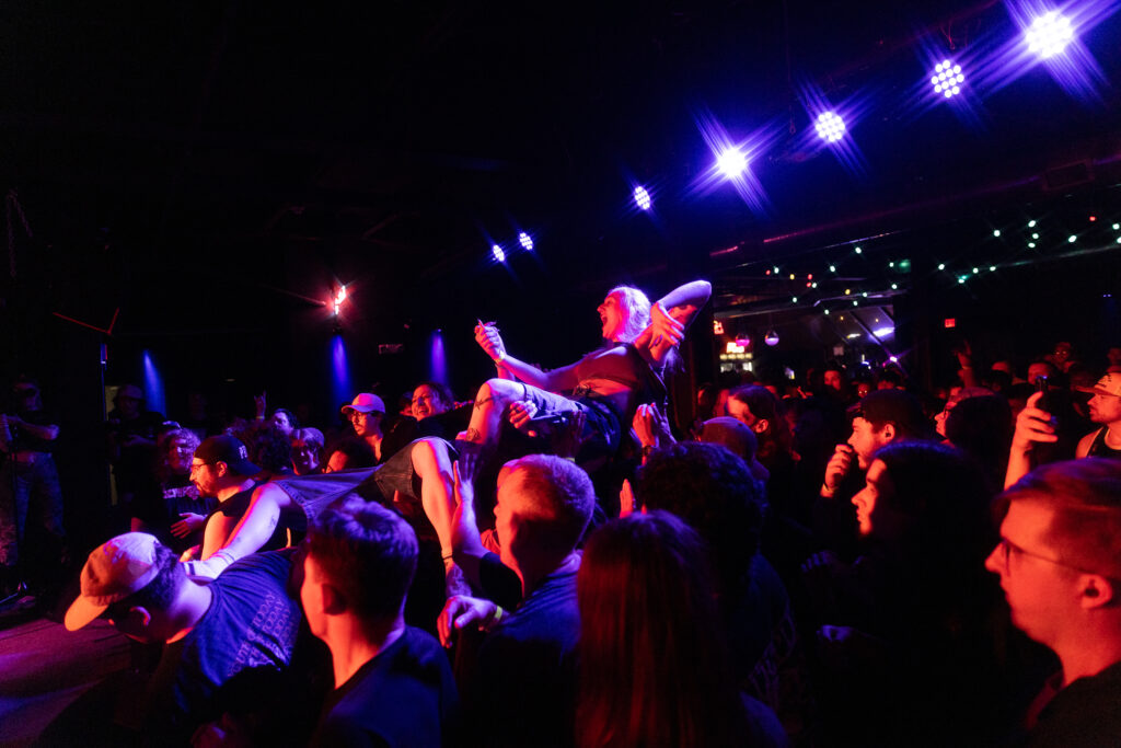 Fans crowd surf during One Step Closer's set during the Warped Tour and Beyond tour Wednesday, June 11, 2025 at The Song & Dance in Syracuse, N.Y. Photo by Kayla Breen.