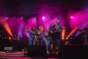 Grinning from ear to ear, Iron & Wine's Sam Beam and the members of I’m With Her wrapped up the night with a spirited collaborative performance at Beak & Skiff Apple Orchards on Friday, June 25, 2025.