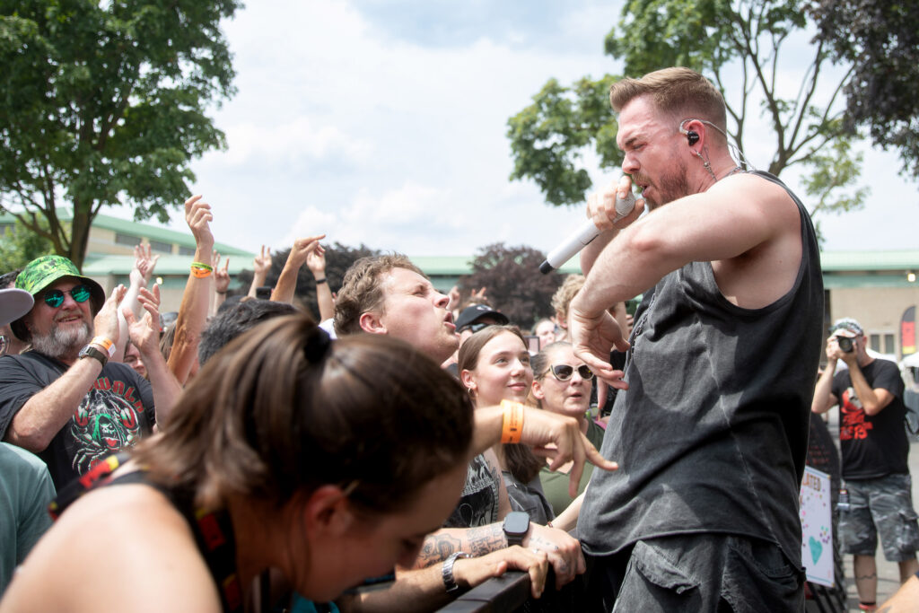 Set It Off's Cody Carson performs from the barricade during the Krockathon Reboot at the New York State Fairgrounds Saturday, July 26, 2025 in Syracuse, N.Y. Photo by Kayla Breen.