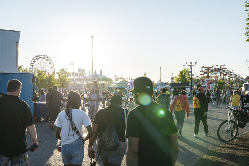 Fairgoers explore day two of the New York State Fair on Thursday, Aug. 21, 2025, in Syracuse, N.Y., before AJR’s headlining performance at Suburban Park Stage.