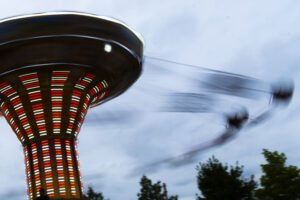 Fairgoers ride the swing carousel at the New York State fair on Aug, 20, 2025. (Photo by Troy Conner)
