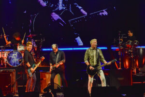 The Offspring rocking out to "Want You Bad" with smiles on their faces during The Offspring's 2025 Supercharge Tour concert on July 22, 2025, at Empower FCU Amphitheater.