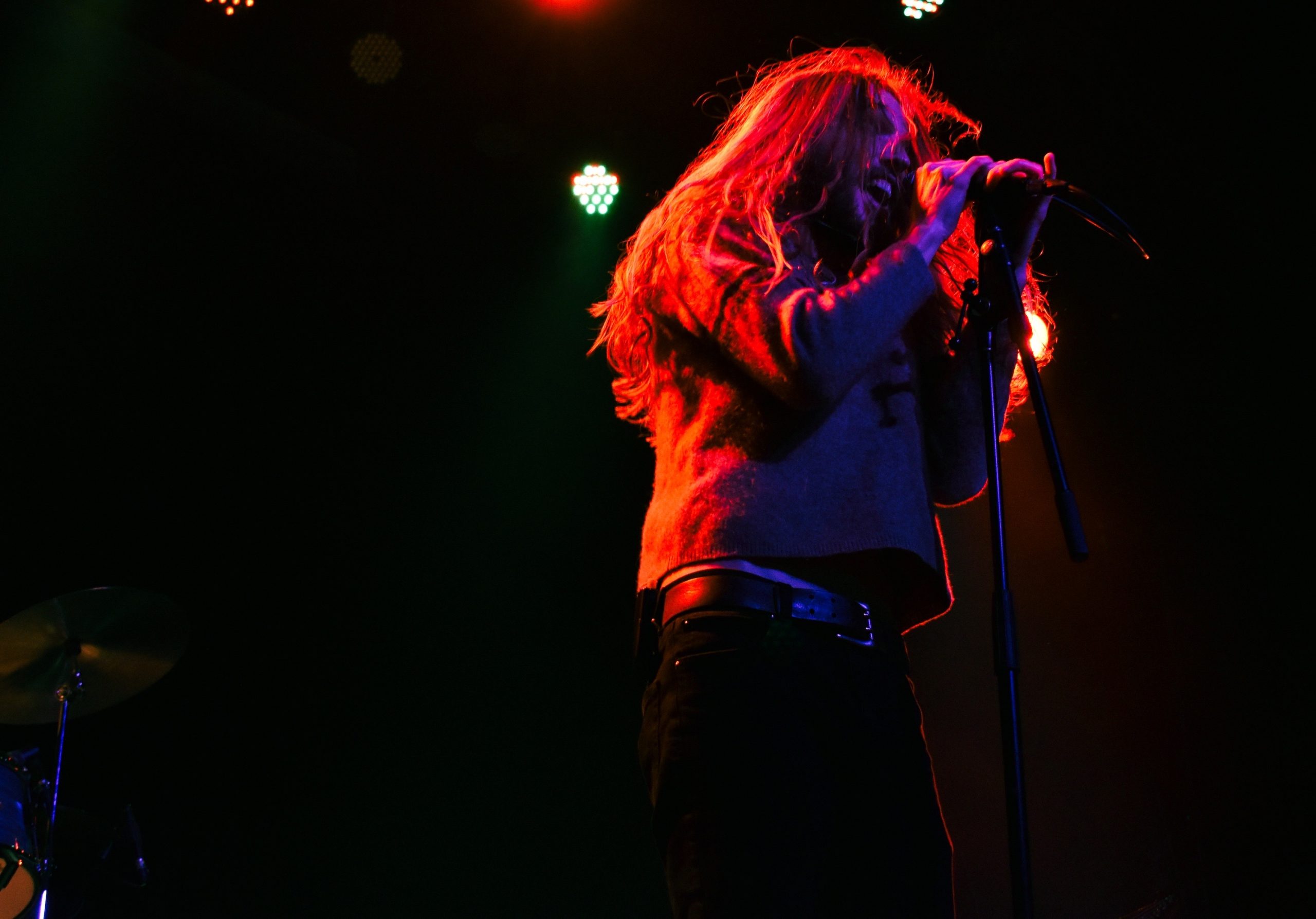 Lead singer, Garrett Barcus, belting during "Find a Love" | Photo by Jenna Sents