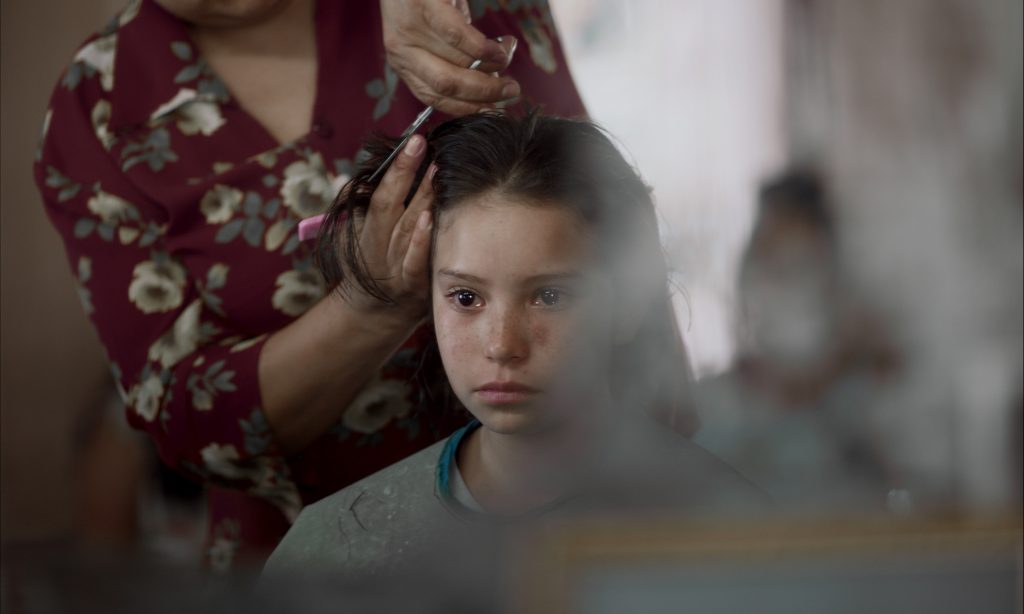 Ana Cristina Ordóñez González as main character Ana has her hair cut in the film Prayers for the Stolen