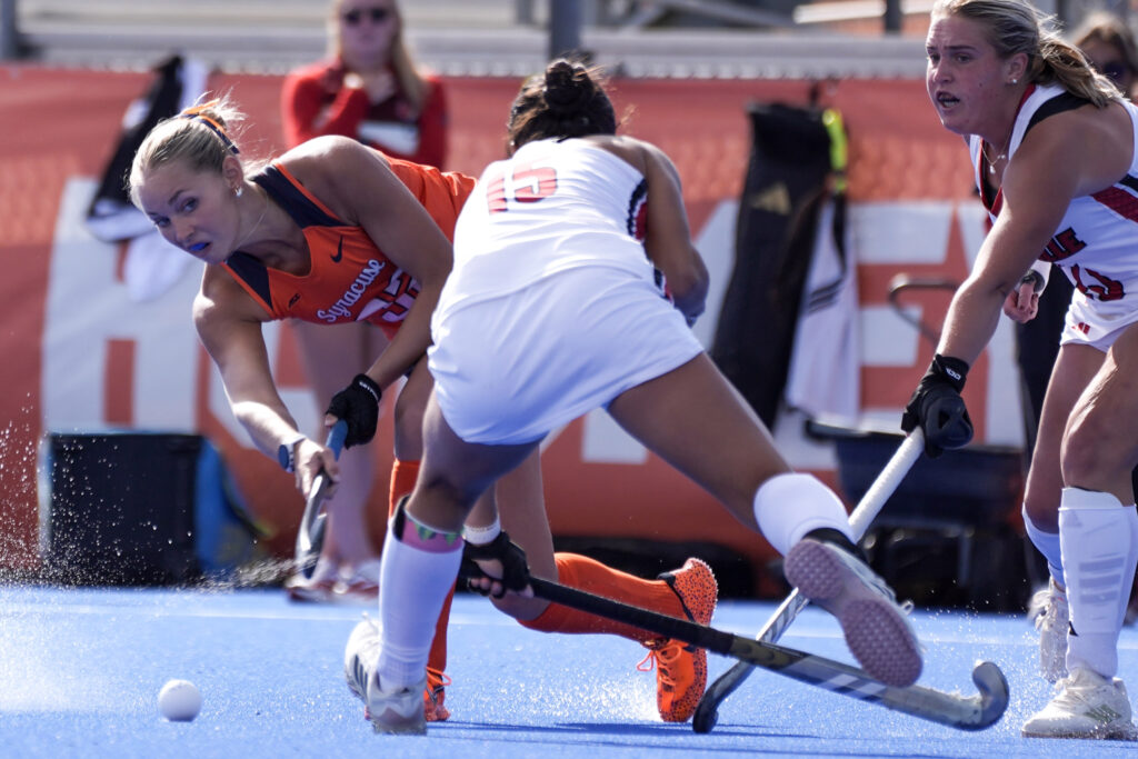 Syracuse defender Chloe Page sneaks the ball past Louisville midfielder Jaelen Perez on Friday, October 9, 2026, at the J.S Coyne Stadium.