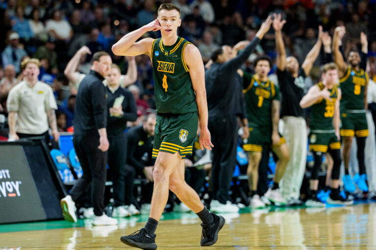 Gavin Doty #4 of the Siena Saints reacts in the first half against the Duke Blue Devils during the first round of the NCAA men's basketball tournament at Bon Secours Wellness Arena on March 19, 2026 in Greenville, South Carolina.