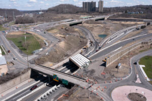 An aerial view of construction at the I-81 and I-481 interchange looking southeast toward Jamesville on Sunday, April 13, 2025. Photo by Kayla Breen.