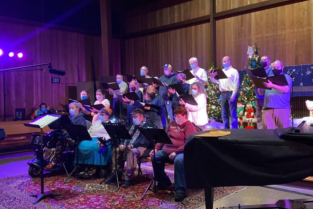 The Syracuse Gay and Lesbian Chorus practicing at their final dress rehearsal before their Holiday concert.