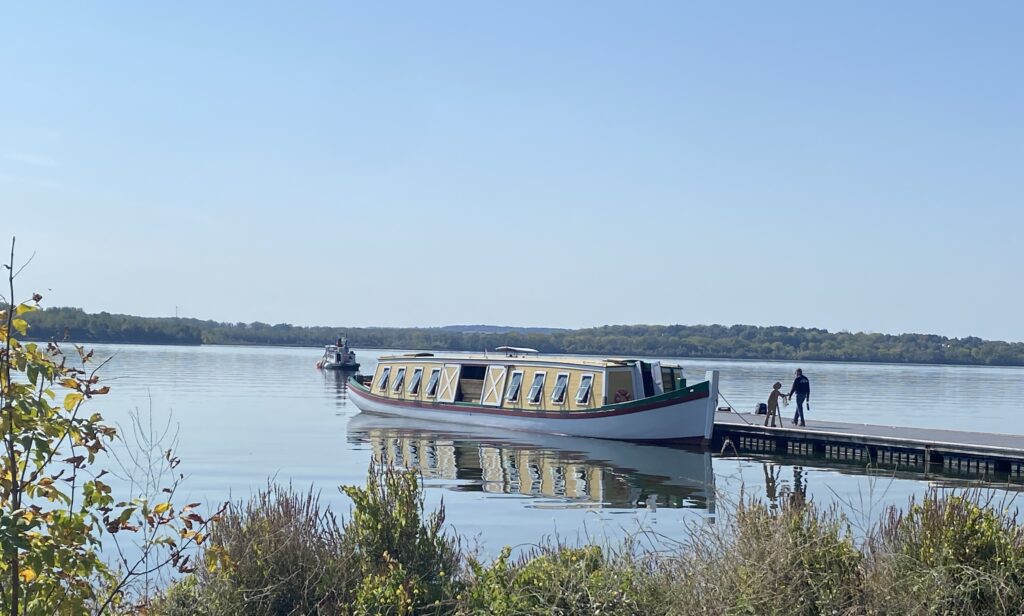 The replica Seneca Chief Erie Canal boat arriving in Syracuse at Onondaga Lake Park