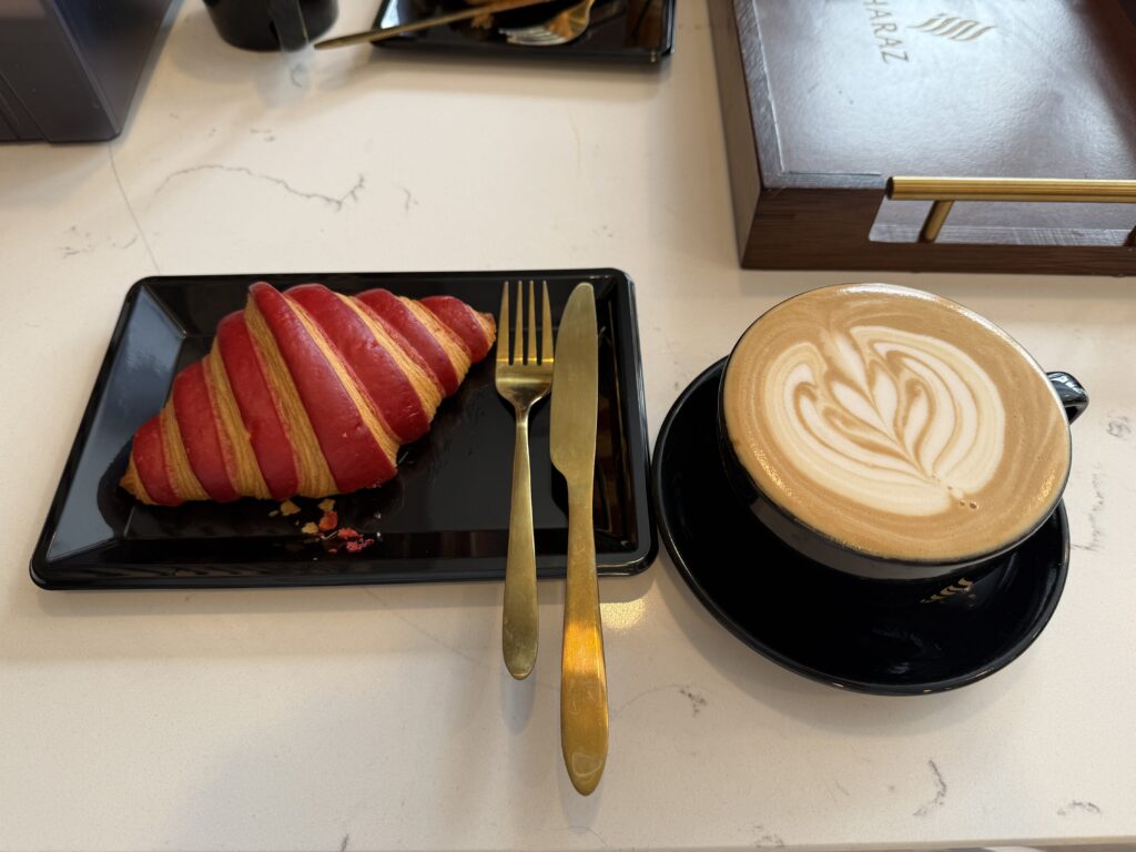 A coffee and a croissant