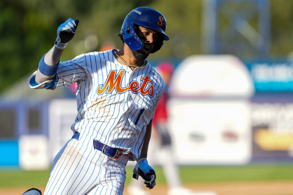 Designated Hitter MJ Melendez rounds third base on his way to home.