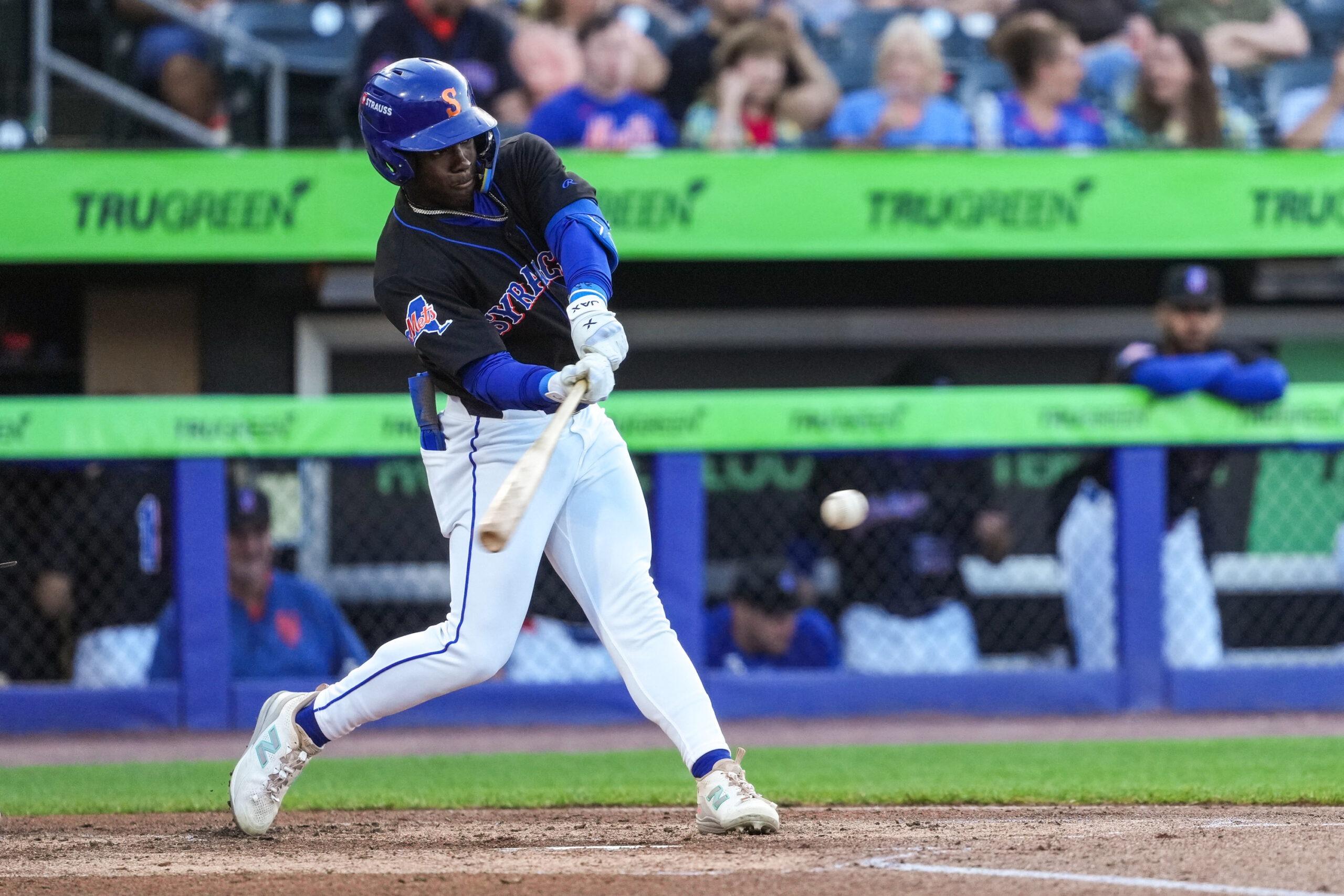 Outfielder D’Andre Smith makes contact with the ball.