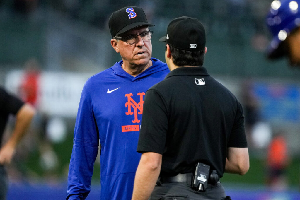 Syracuse Mets Manager Dick Scott confronts the umpire after a player was ejected.