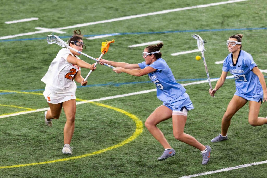 UNC's Tar Heels defends against SU's Midfielder Mackenzie Rich.