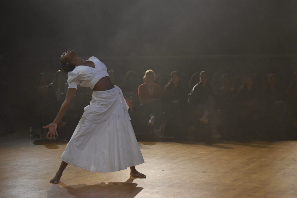 woman dancing in white two piece set