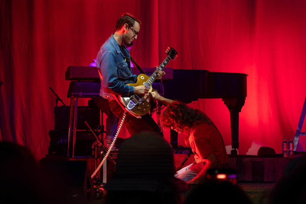 Jesse Welles and Adam Meisterhans share a moment rocking together at Beak and Skiff Apple Orchards on Saturday, August 1, 2026.