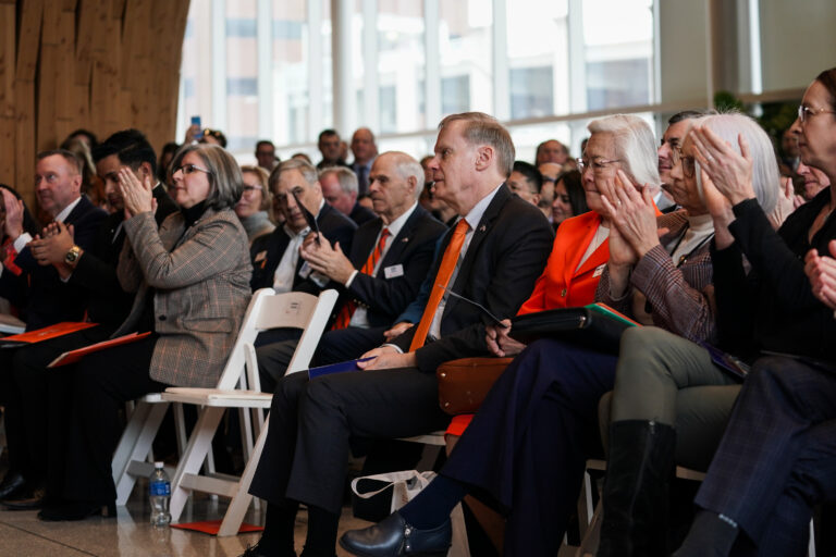 Current SU Chancellor Kent Syverud is applauded at the new chancellor announcement ceremony at the National Veterans Resource Center on Tuesday, March 3, 2026. (Photo by Jack Henry / Newhouse School)
