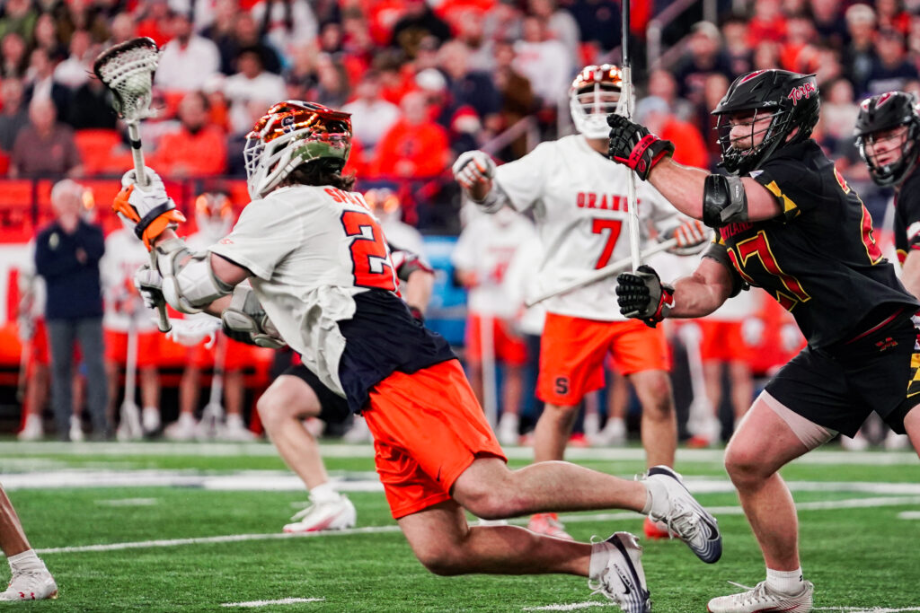Syracuse attacker Joey Spallina dives for a shot-on-goal against Maryland at the JMA Wireless Dome on Friday, Feb. 13.