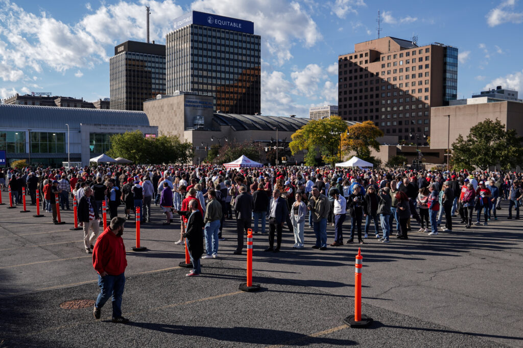 Attendees to Donald Trump and Republican gubernatorial candidate Bruce Blakeman campaign rally line up outside of the Oncenter on Friday, Oct. 9, 2026.