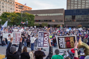 Anti-Trump protesters gather during Trump's rally at the Oncenter to protest his visit to Syracuse at Clinton Square on Friday, Oct. 9, 2026.