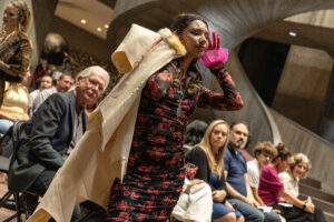 Model for Stiletto Love Boutique strikes a pose at the top of the runway during Syracuse Fashion Week's show at the Everson Museum of Art on Sept. 28, 2026.